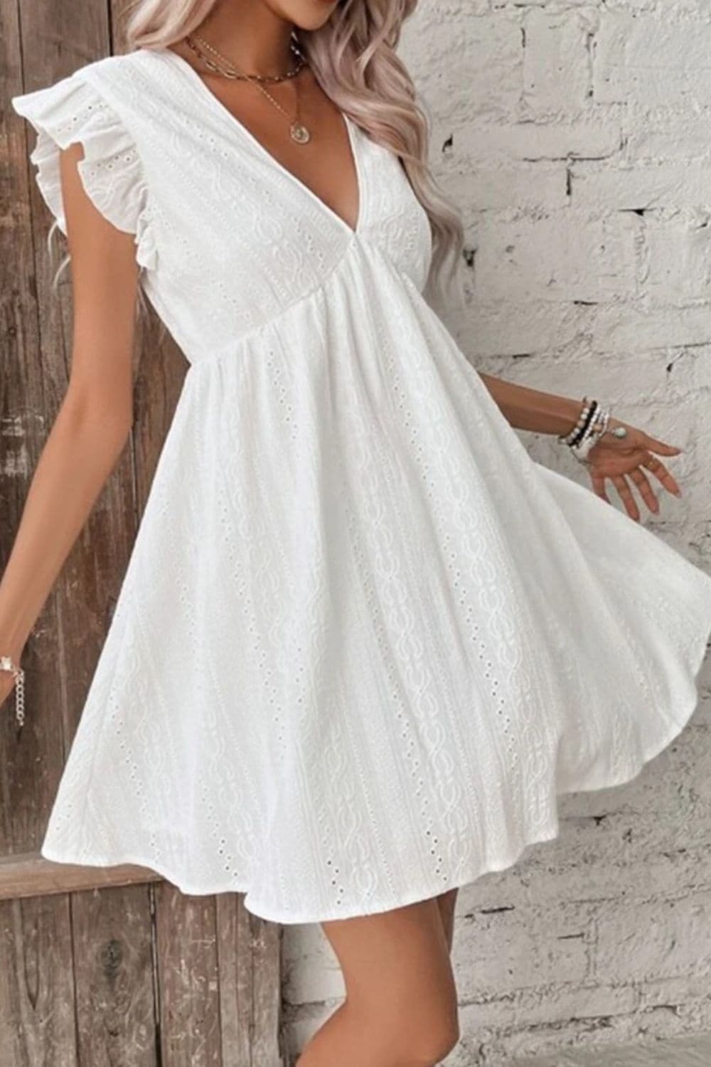 Eyelet Ruffled Cap Sleeve Mini Dress.