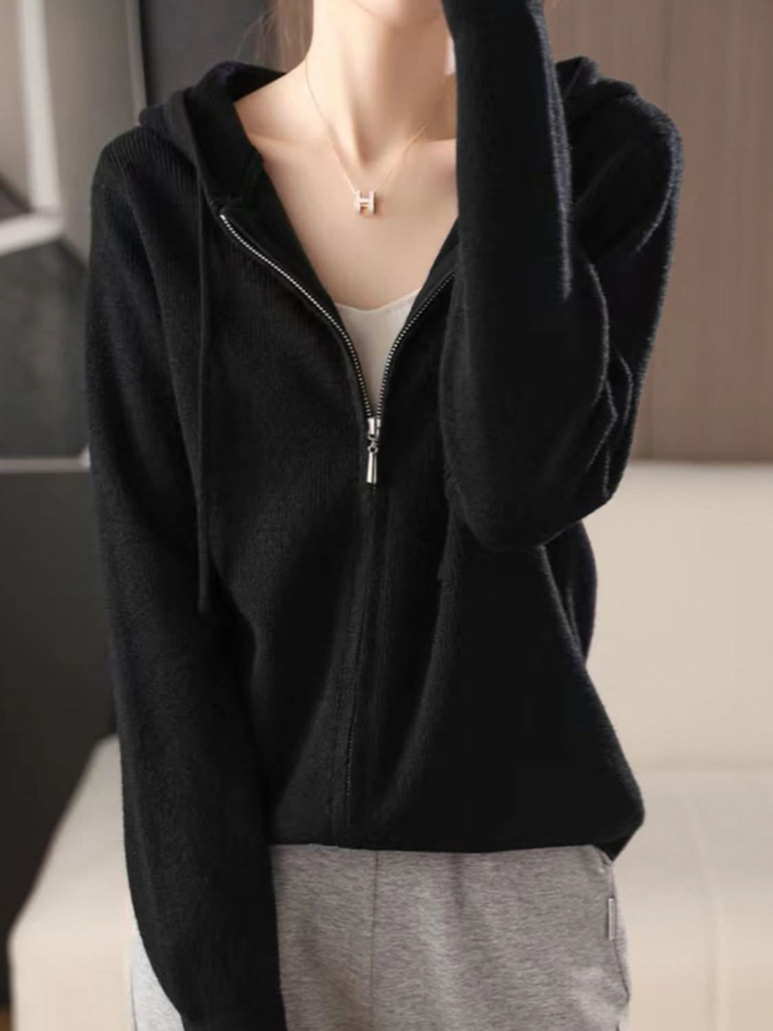 Cozy drawstring hooded sweater with zip-up design