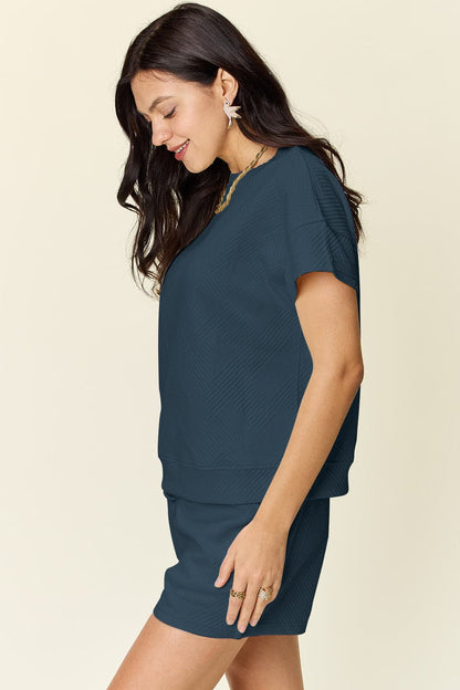 Double Take Full Size Texture Short Sleeve T-Shirt and Drawstring ShorFeatures: Drawstring
Number of pieces: Two-piece
Stretch: Slightly stretchy
Material composition: 97% polyester, 3% spandex
Care instructions: Machine wash cold. TumLove Salve Full Size Texture Short SleeveTwo-Piece Sets