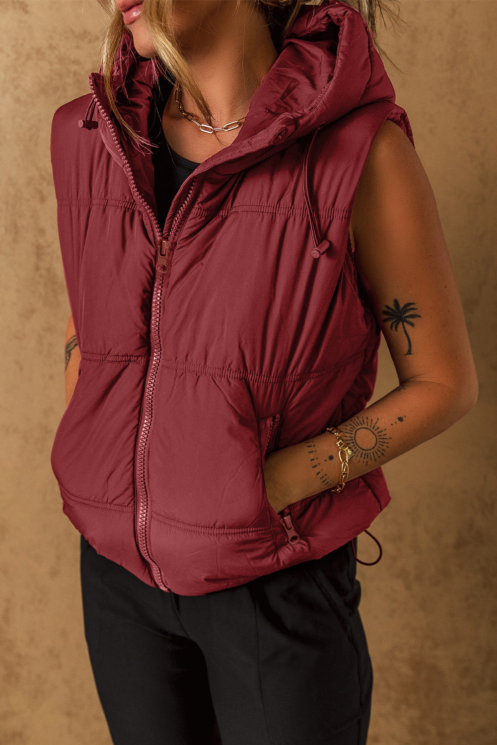 Clay hooded puffer vest with zip-up and side pockets