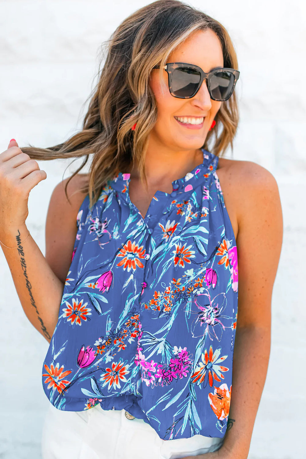 Charming sky blue floral tank top with buttoned neckline