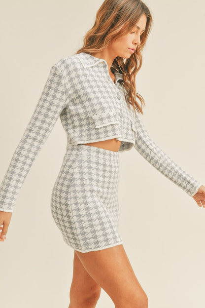 Chic houndstooth knit cardigan and mini skirt ensemble