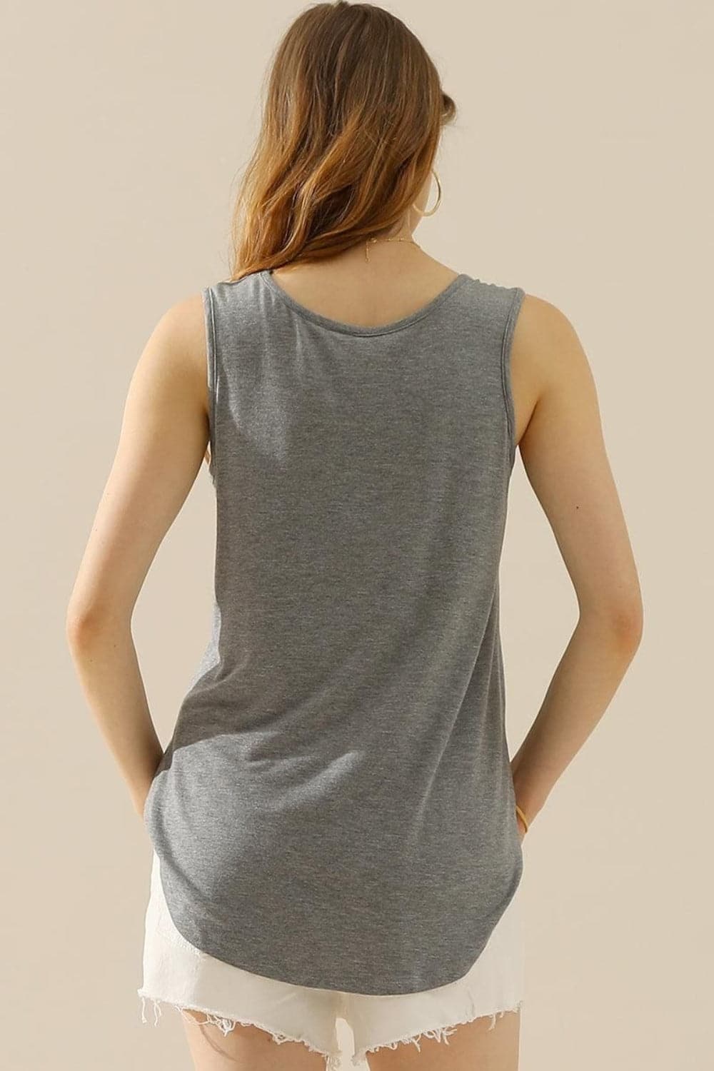 Ninexis Full Size V-Neck Curved Hem Tank.