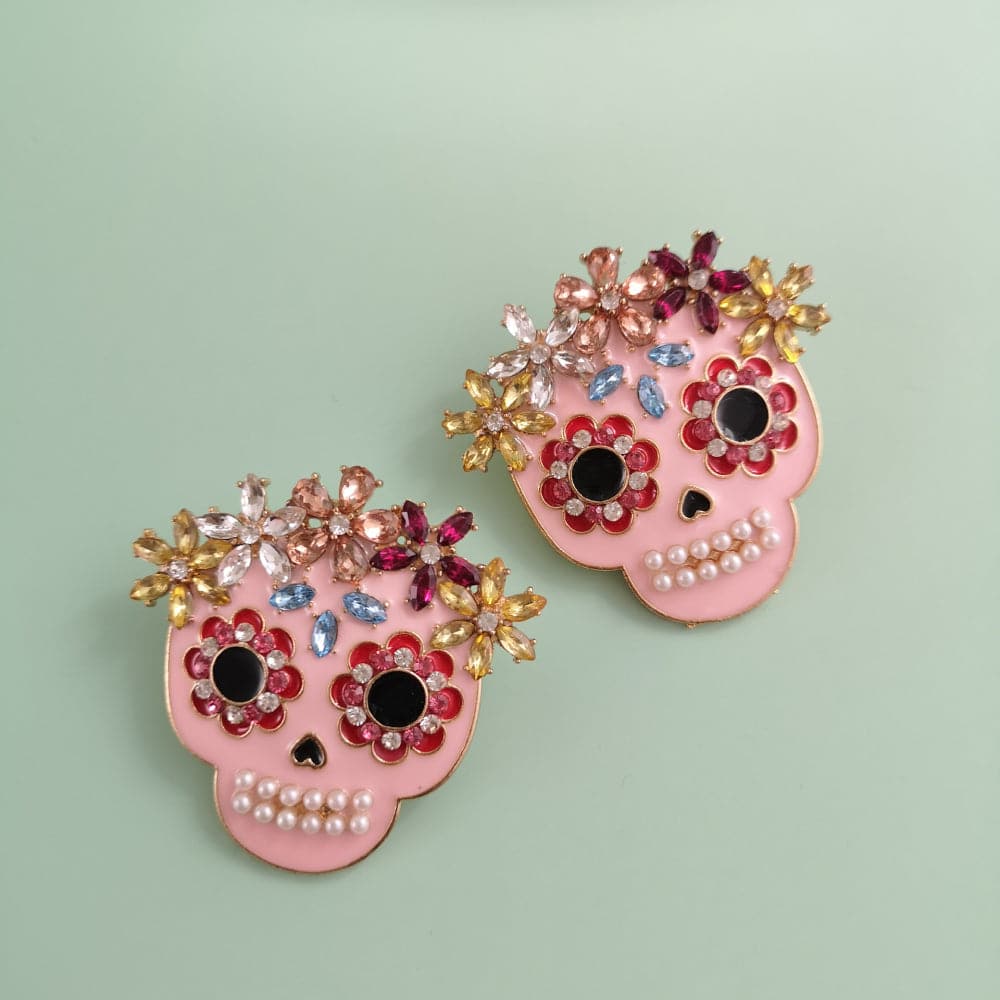 Rhinestone skull earrings in alloy