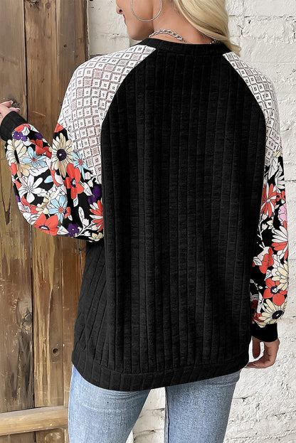 Elegant black floral patchwork ribbed blouse with long sleeves