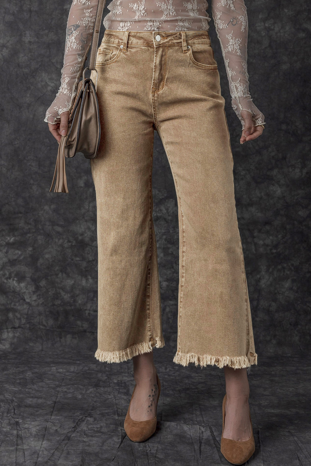 Chic light beige high-rise cropped wide-leg jeans with frayed hem