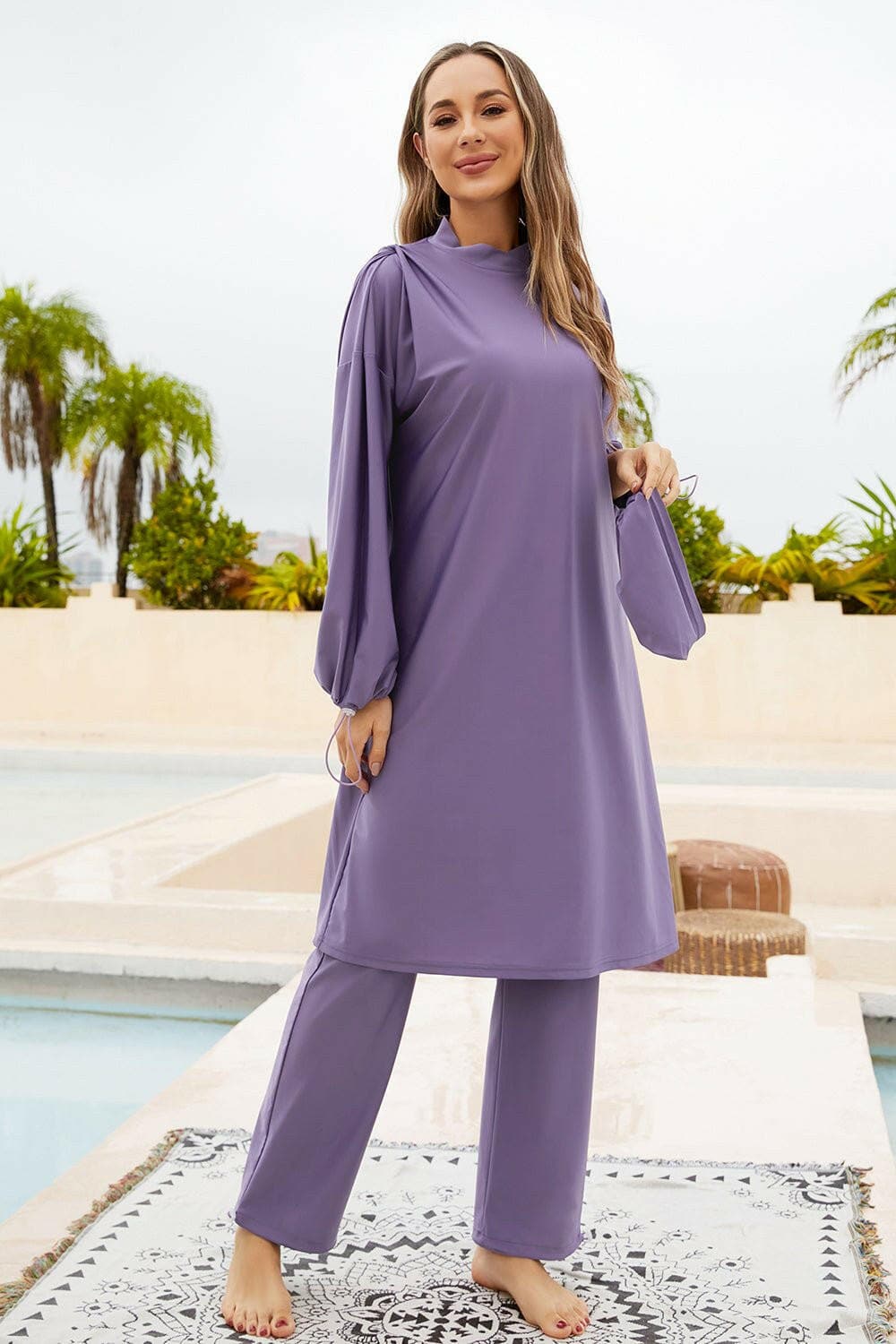 Stylish drawstring swim set with mock neck long sleeve top in purple, perfect for effortless movement and natural feel.