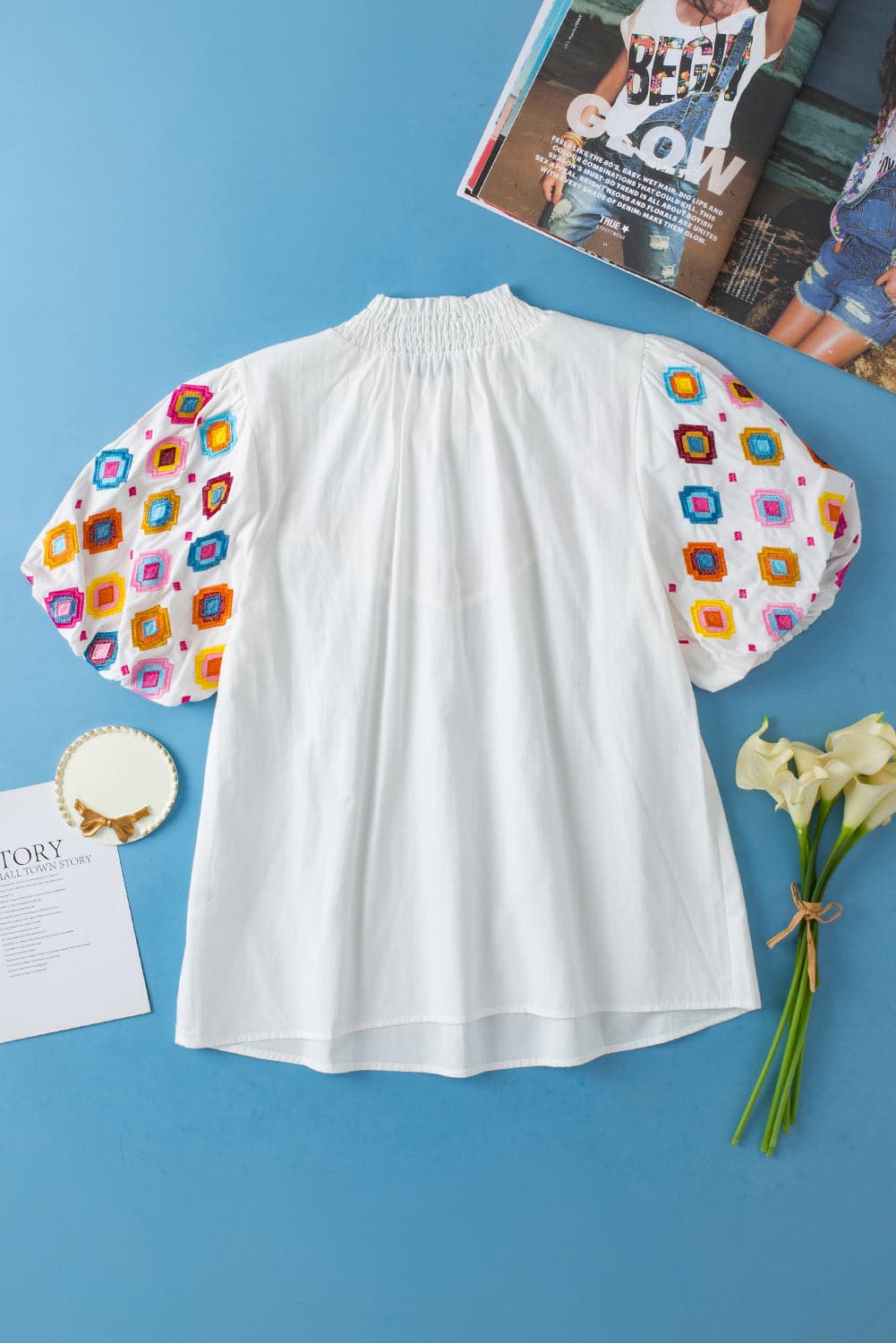 Printed Mock Neck Puff Sleeve Blouse.