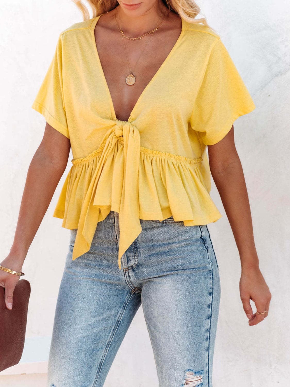 Tied Plunge Short Sleeve Blouse.