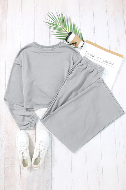 Chic light grey criss cross activewear set for effortless style