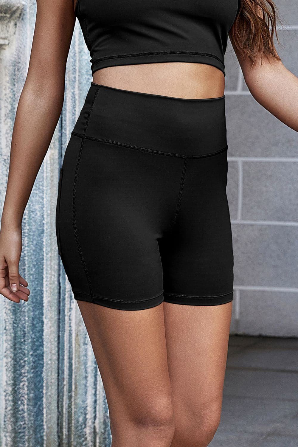 Exposed Seam Decorative Button Yoga Shorts.