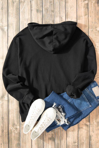 Cozy black fleece-lined hoodie with kangaroo pocket and drawstring design