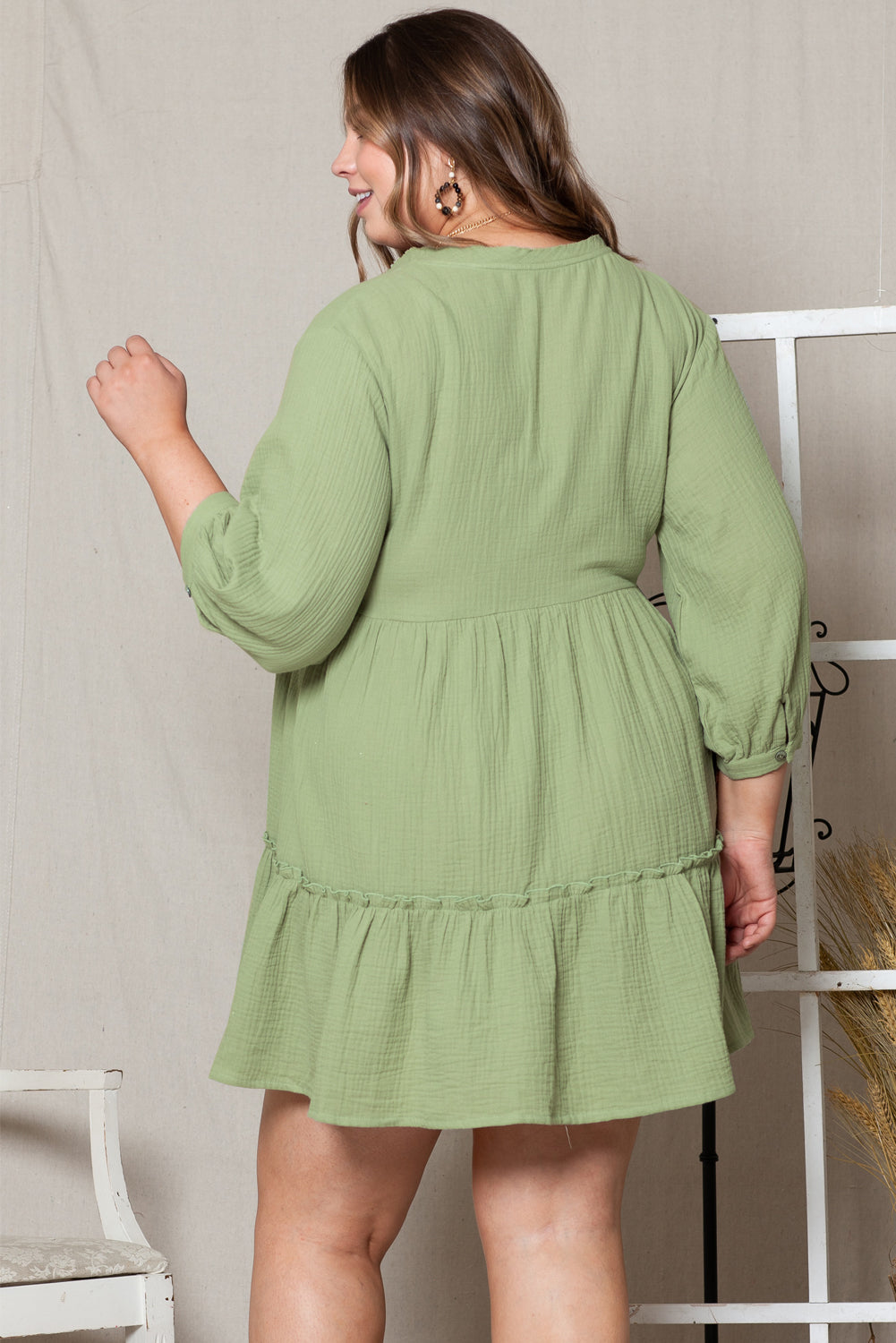 Chic green ruffled v-neck plus size mini dress with button details