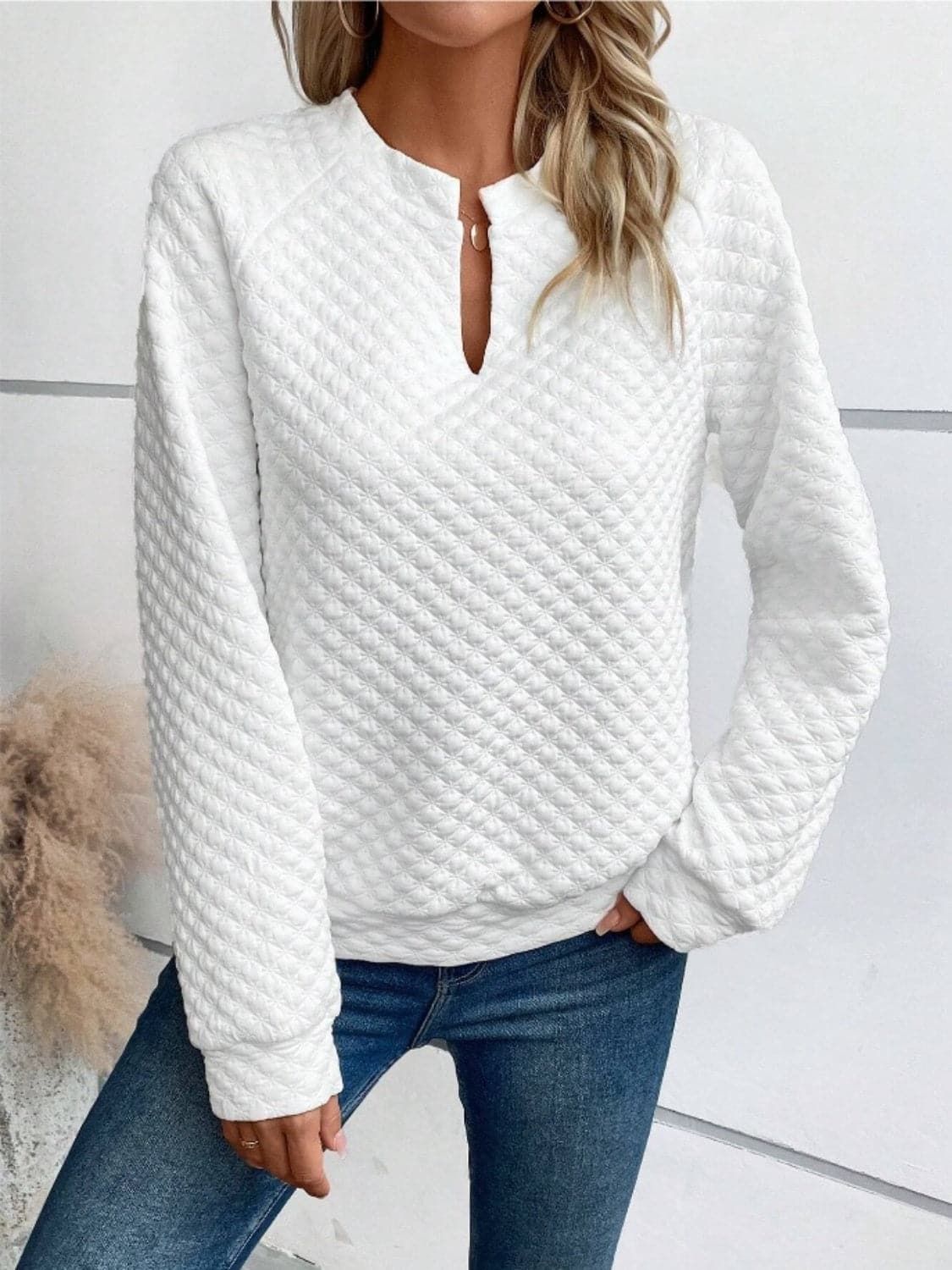 Notched Long Sleeve Sweatshirt.