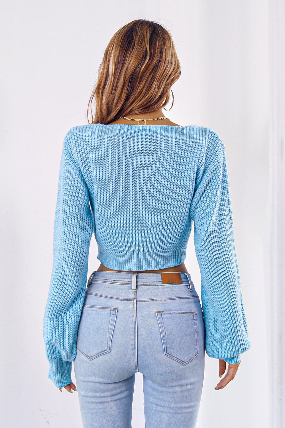 Bow V-Neck Long Sleeve Cropped Sweater.