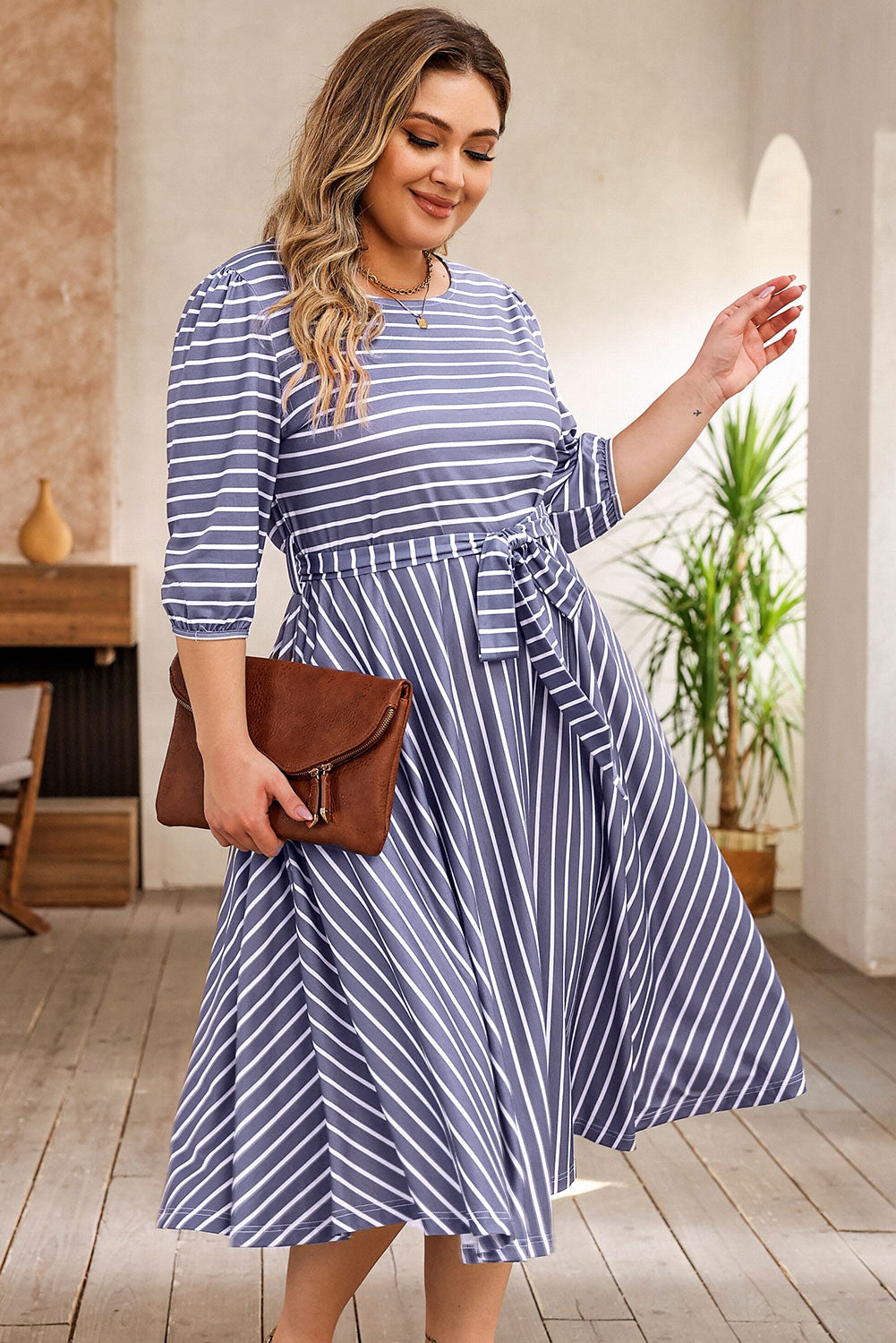 Chic gray striped plus size dress with tie waist and 3/4 sleeves