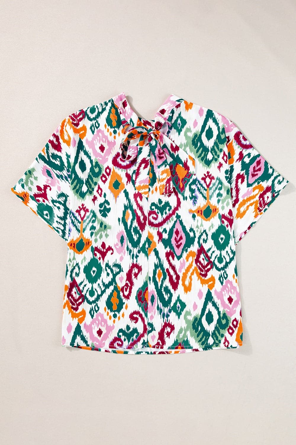 Printed Mock Neck Half Sleeve Blouse.