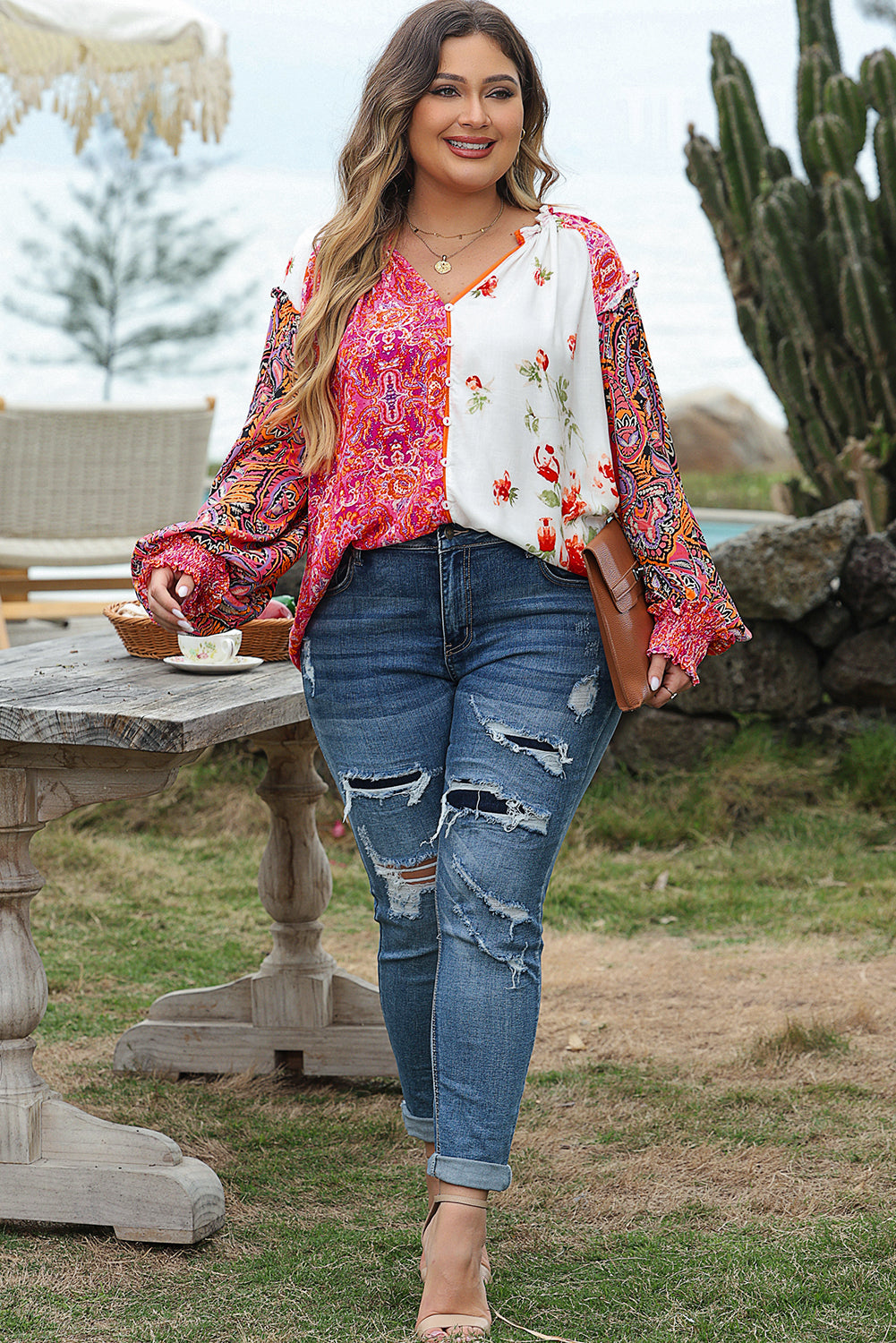 Floral charm: Pink patchwork blouse with shirred cuffs