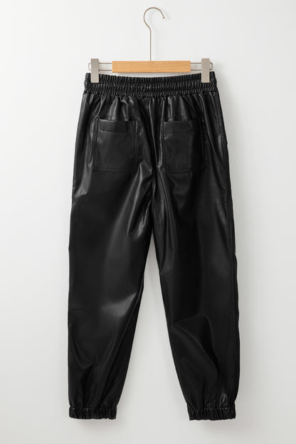 Chic black faux leather joggers with smocked waist and drawstring detail