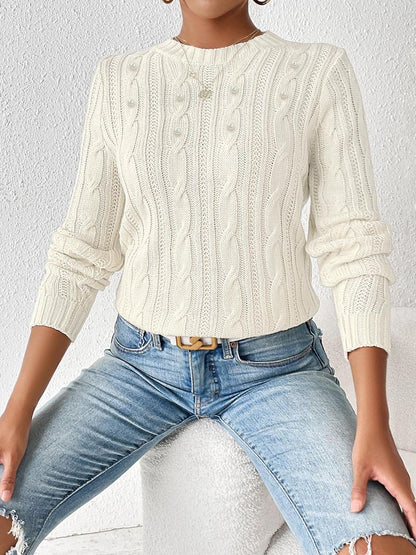 Cozy cable-knit long sleeve sweater with round neckline