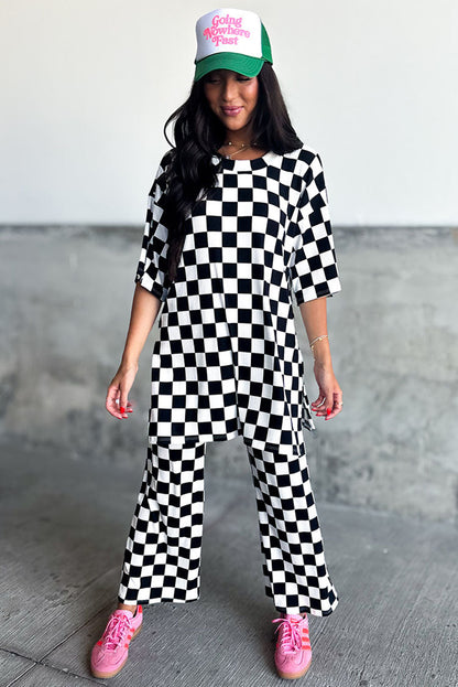 Chic black checkered tunic top and flared pant ensemble