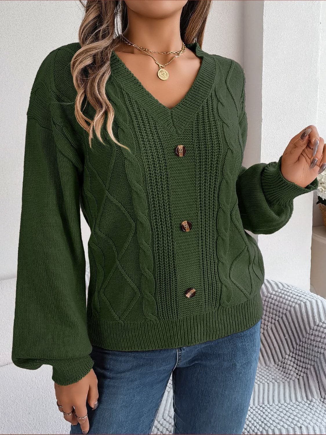 Cable-Knit Buttoned V-Neck Sweater.