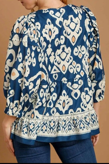 Floral print V-neck blouse with three-quarter sleeves