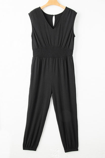 Plus size black smocked jumpsuit