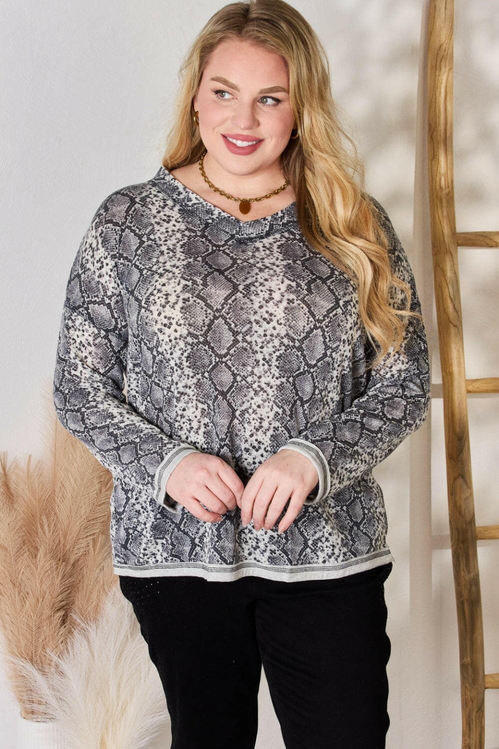 Hailey & Co Full Size Snakeskin V-Neck Long Sleeve TopStep Into the Spotlight with Hailey &amp; Co
 Embrace your boldness and stay on trend with the Hailey &amp; Co Full Size Snakeskin V-Neck Long Sleeve Top. This stunnLove Salve -Neck Long Sleeve Topcloseout