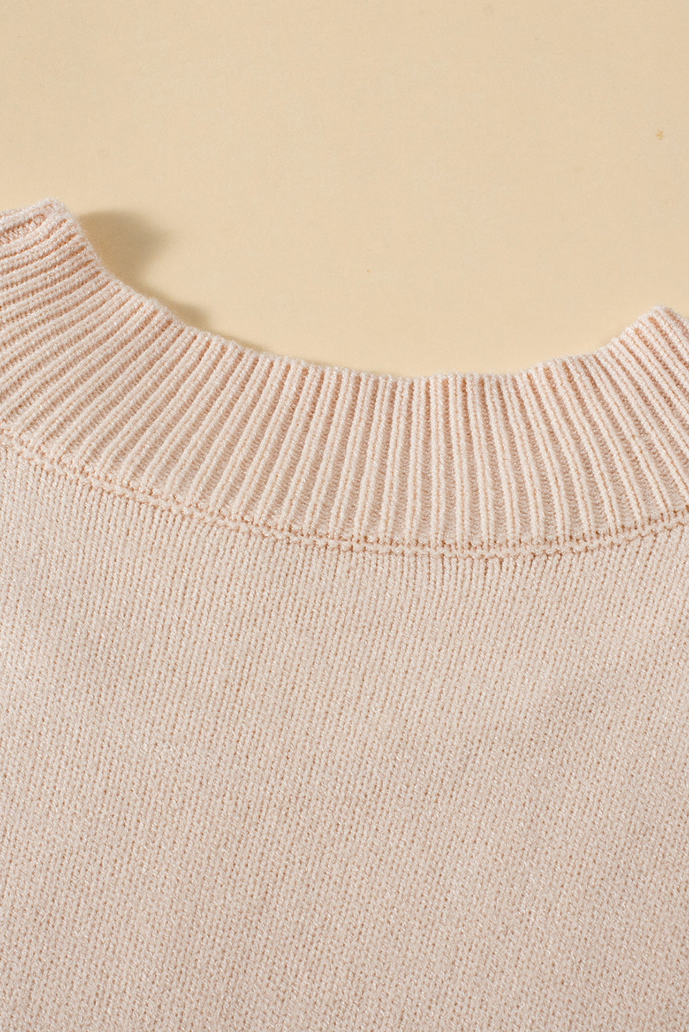 Chic oatmeal cable knit mock neck sweater with ruffled sleeves