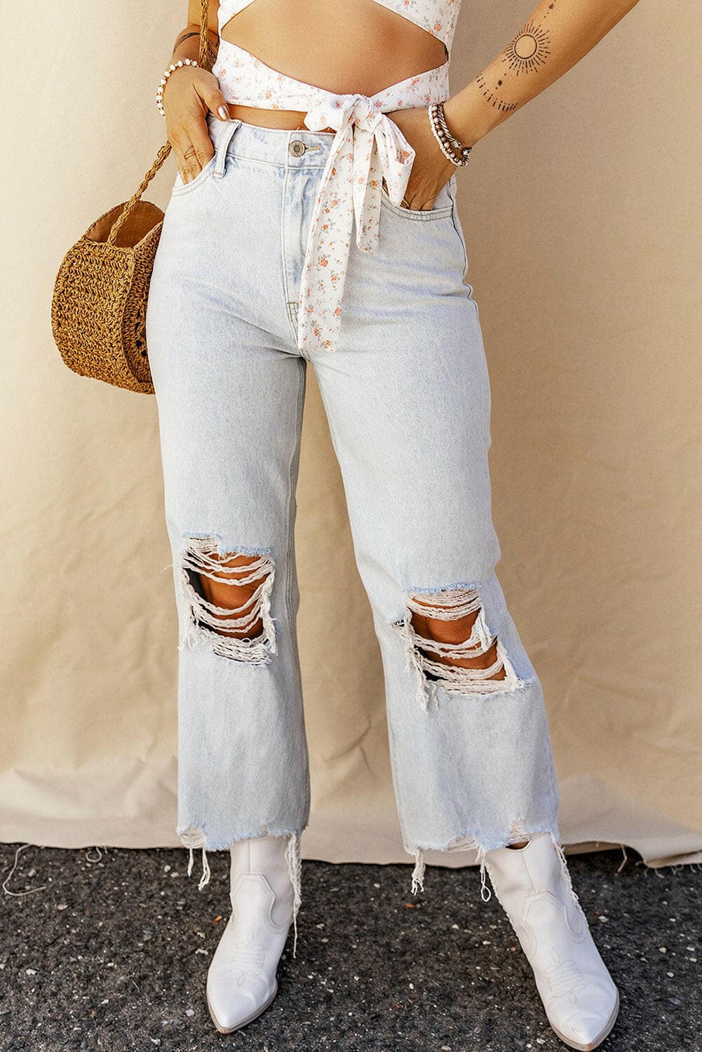 Distressed Denim Jeans with Raw Edge Detail.