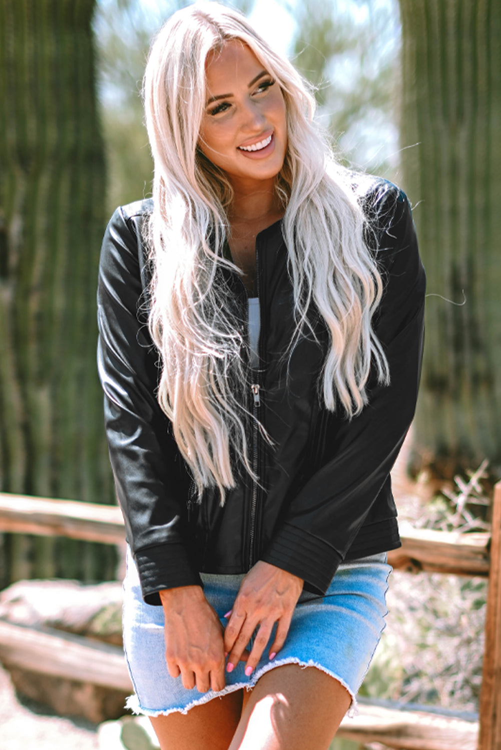 Sleek black faux leather bomber jacket