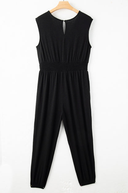 Elegant black plus size smocked jumpsuit with v-neck and sleeveless design