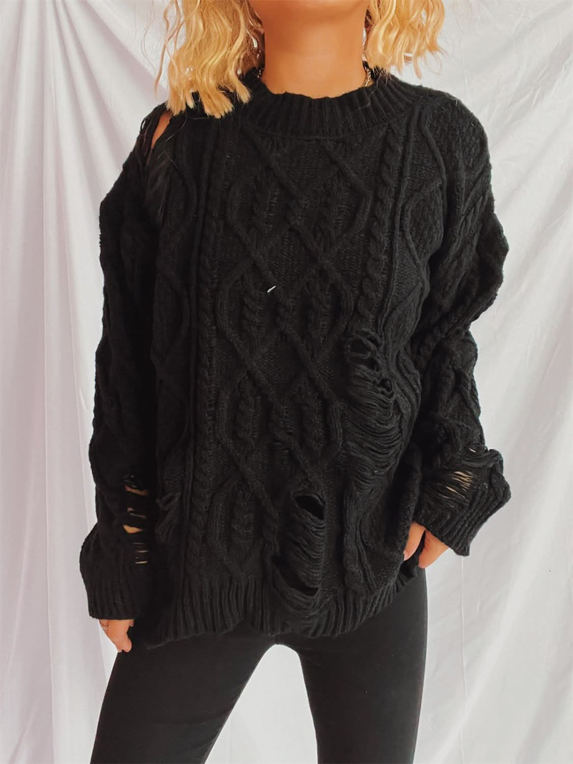 Chic distressed cable-knit sweater