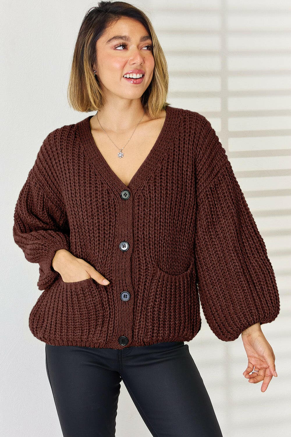 Pocketed Button Up Dropped Shoulder Cardigan.