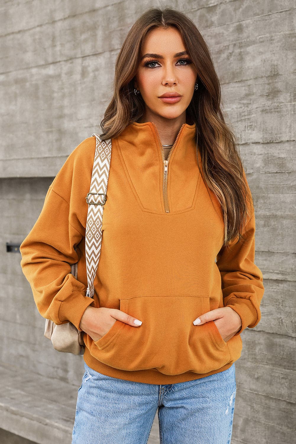 Quarter Zip Dropped Shoulder Sweatshirt.