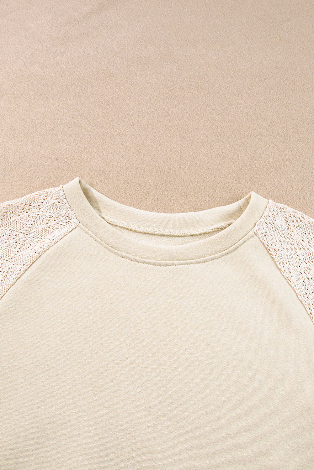 Chic parchment eyelet knit patchwork pullover with raglan sleeves