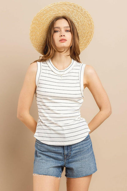 Striped Round Neck Tank Top - Summer EssentialUpgrade Your Summer Wardrobe with Style
 Introducing our Ces Femme Striped Round Neck Tank Top, a must-have for your summer wardrobe. Crafted from a soft and breathaLove Salve Striped Round Neck Tank Top - Summer Essentialjust arrived