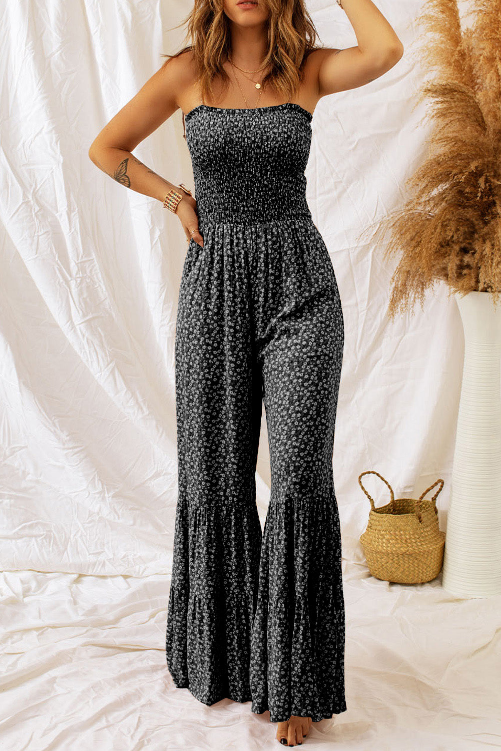 Floral wide-leg jumpsuit with smocked bodice and thin straps