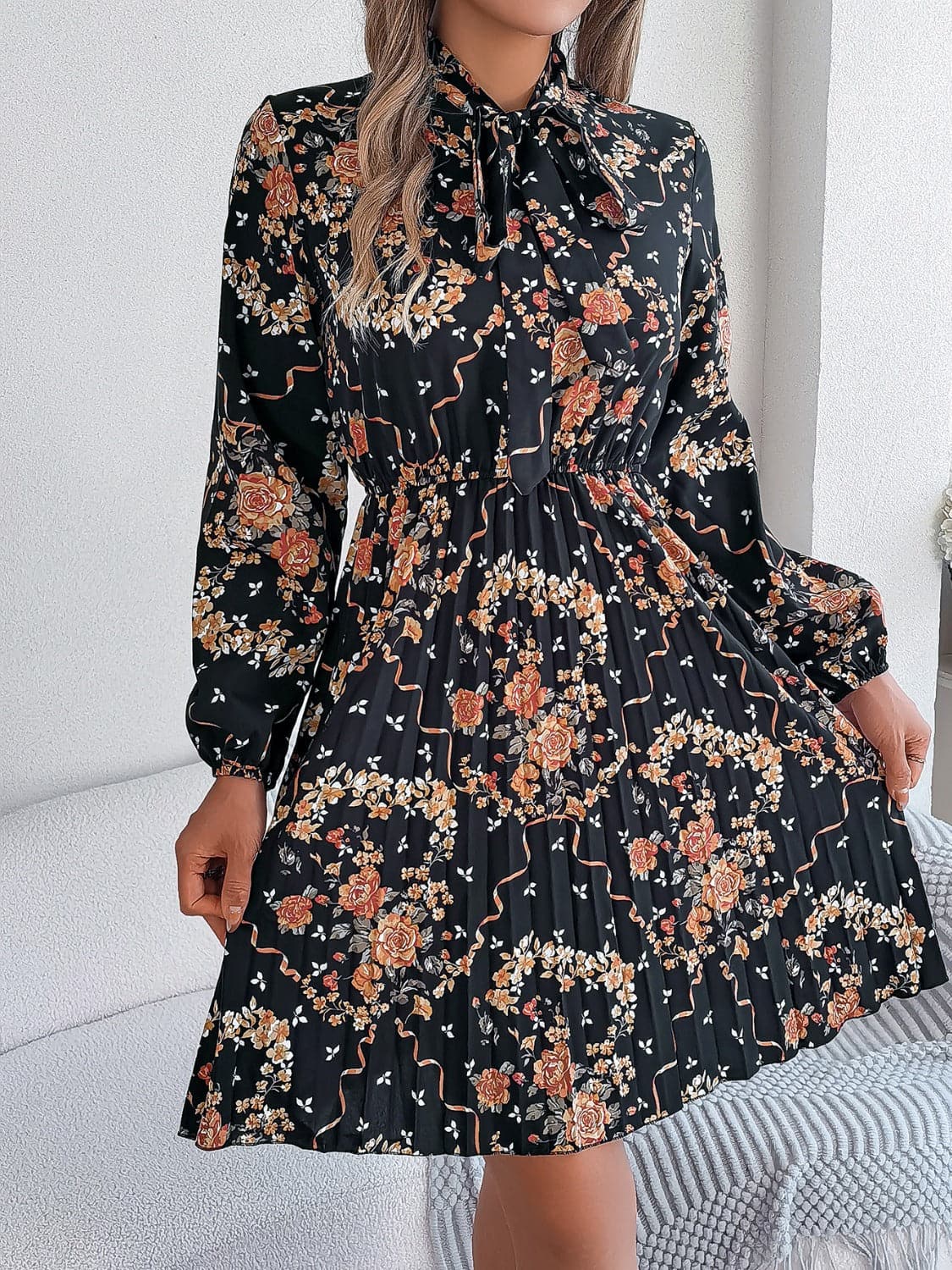 Pleated Printed Tie Neck Long Sleeve Dress.