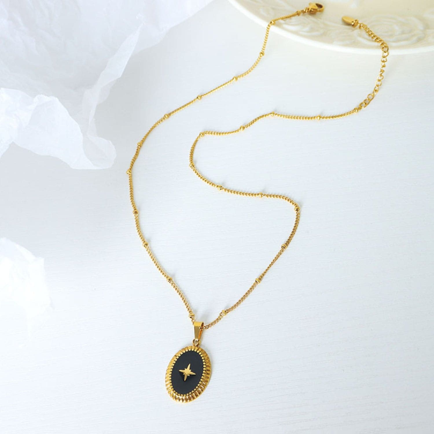 Gold-Plated Titanium Steel Oval Shape Pendant Necklace.