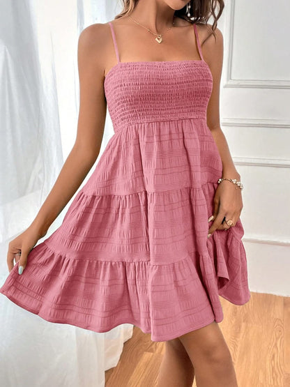 Smocked Tiered Sleeveless Mini Dress.