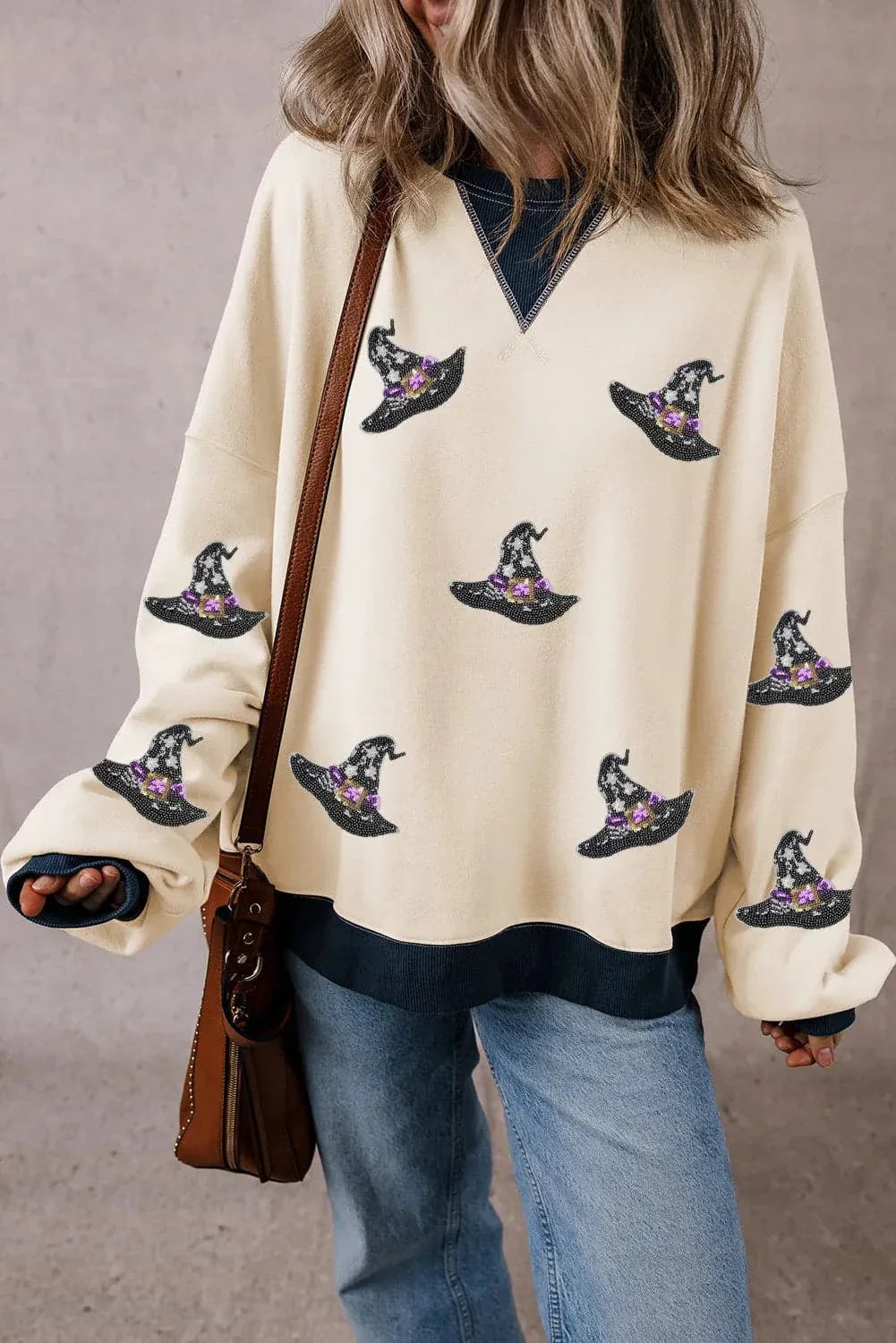 Sequin hat print long sleeve sweatshirt with sheer detailing and casual style.