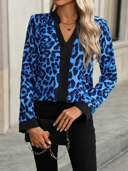 Leopard print blouse with notched sleeves