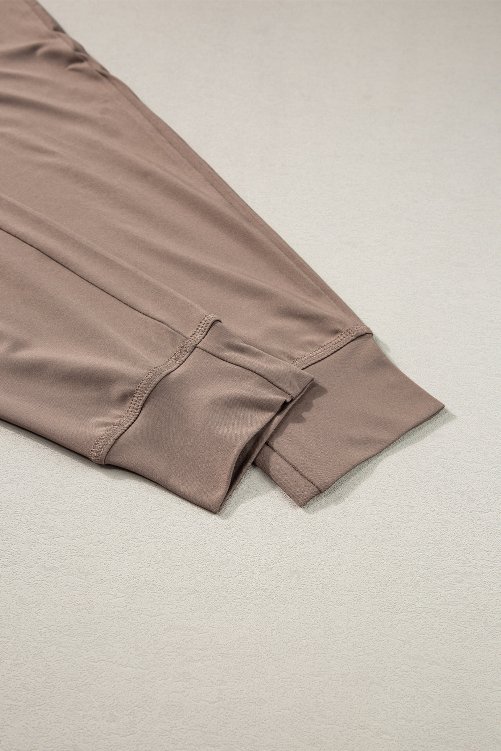 Cozy dark brown joggers with adjustable drawstring and pockets