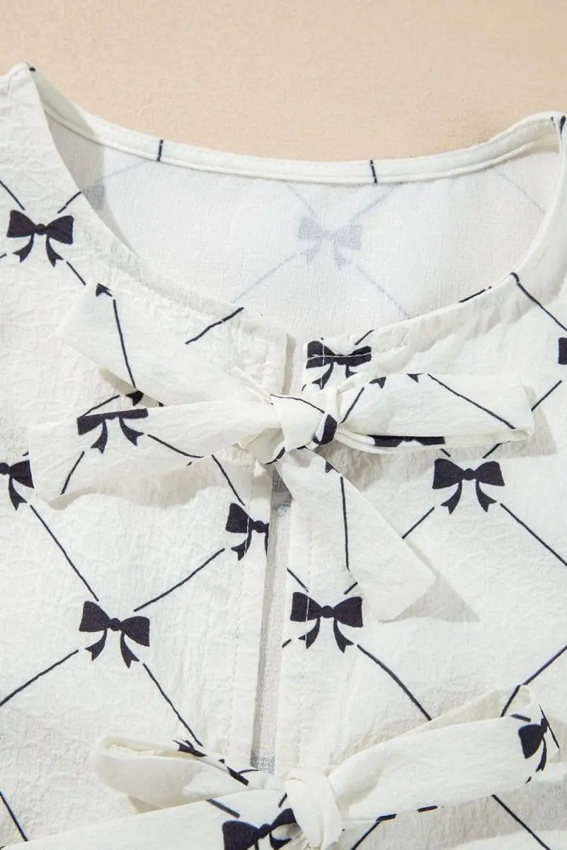 Charming White Bowknot Print Bubble Sleeve Blouse with Front Knots - Love Salve 