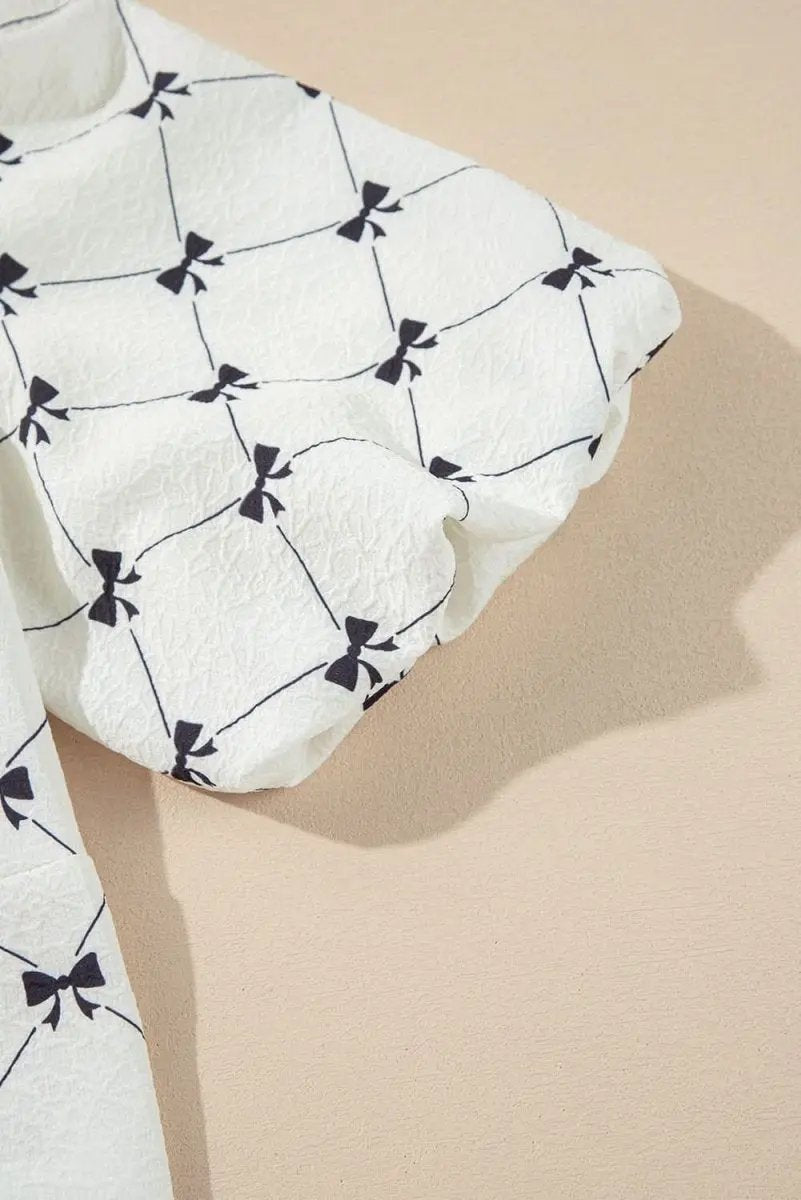 Charming White Bowknot Print Bubble Sleeve Blouse with Front Knots - Love Salve 