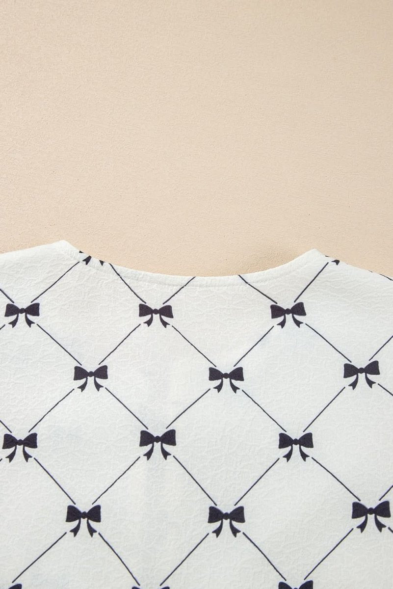 Charming White Bowknot Print Bubble Sleeve Blouse with Front Knots - Love Salve 