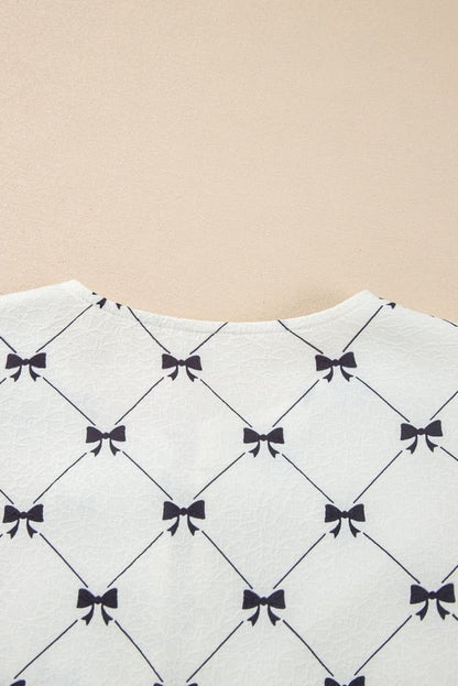 Charming White Bowknot Print Bubble Sleeve Blouse with Front Knots - Love Salve 