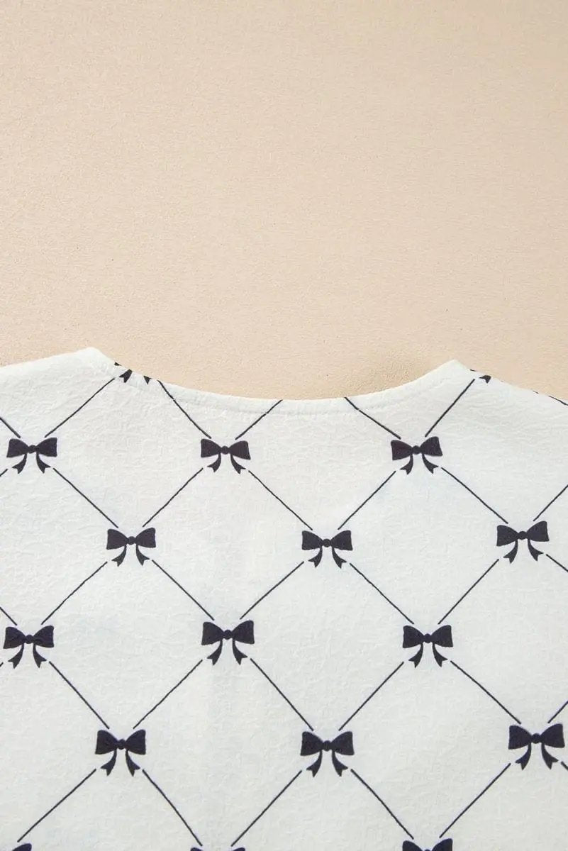 Charming White Bowknot Print Bubble Sleeve Blouse with Front Knots - Love Salve 
